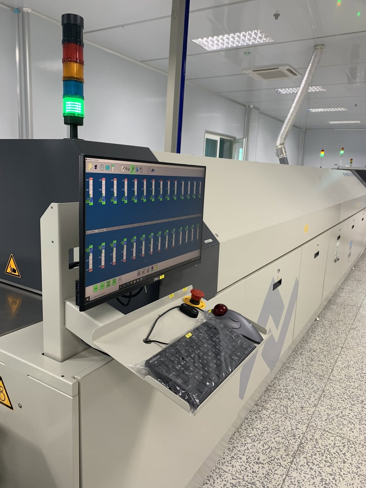 Multi-zone SMT reflow soldering oven with thermal monitoring system