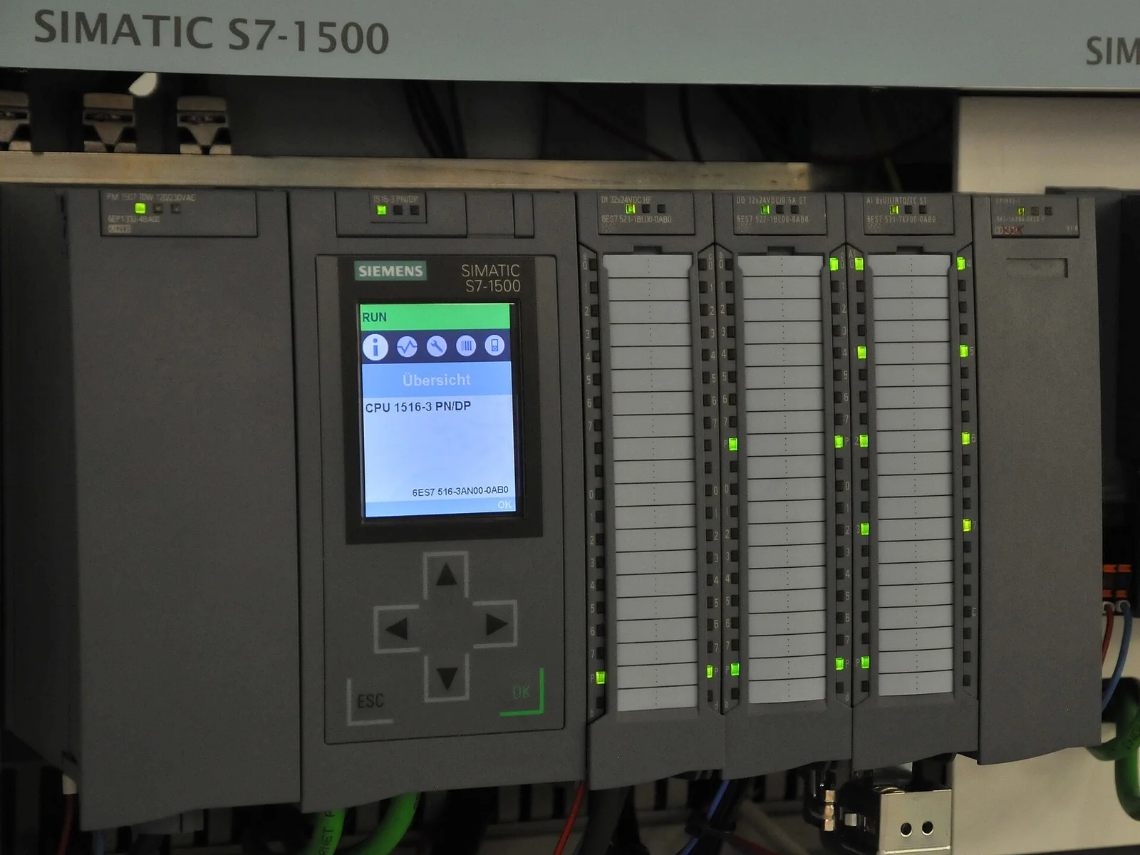 Industrial Siemens PLC controller and automation modules in factory cabinet