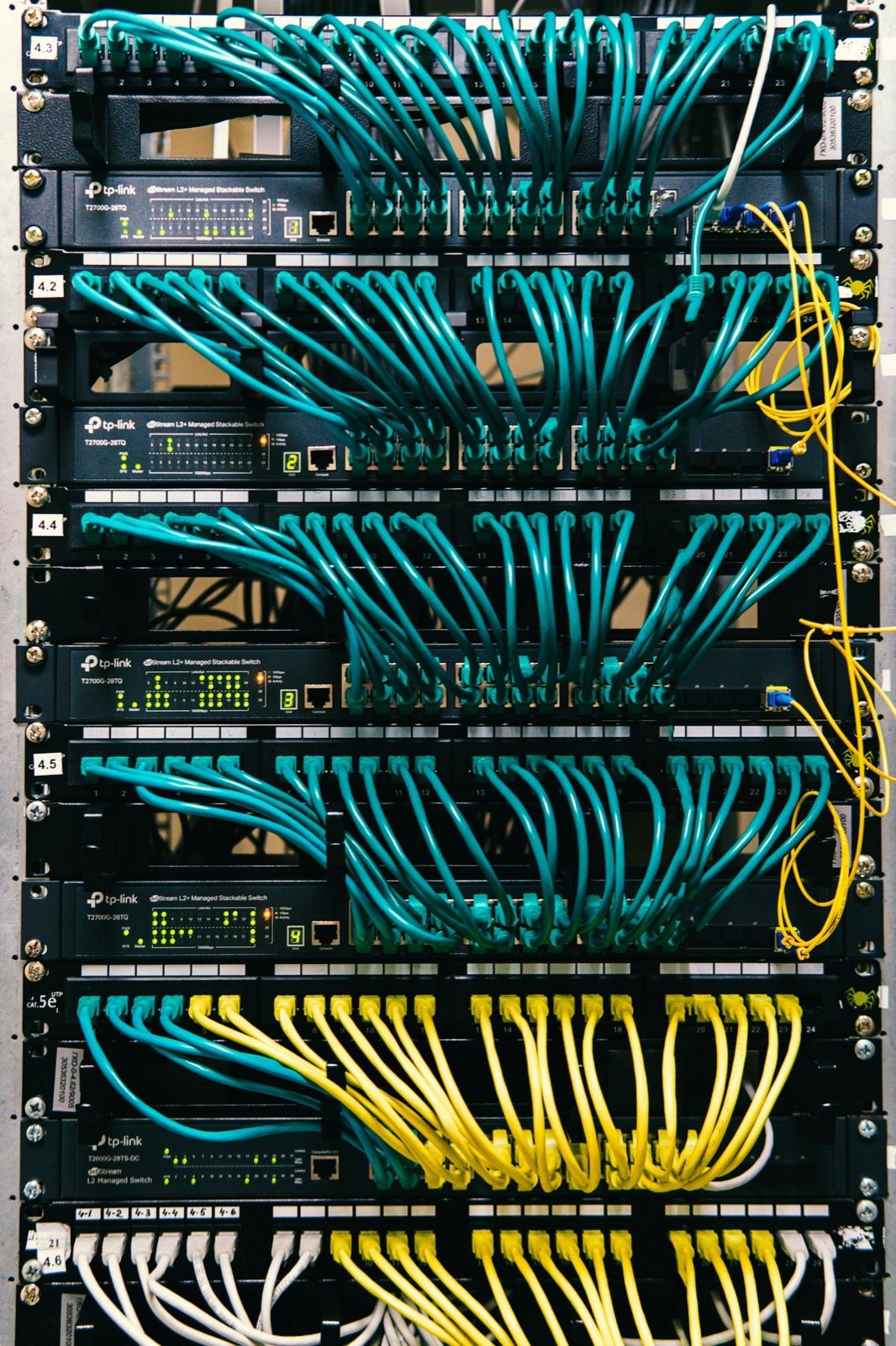 Managed Ethernet PoE switch rack distributing power and audio streams to IP speakers