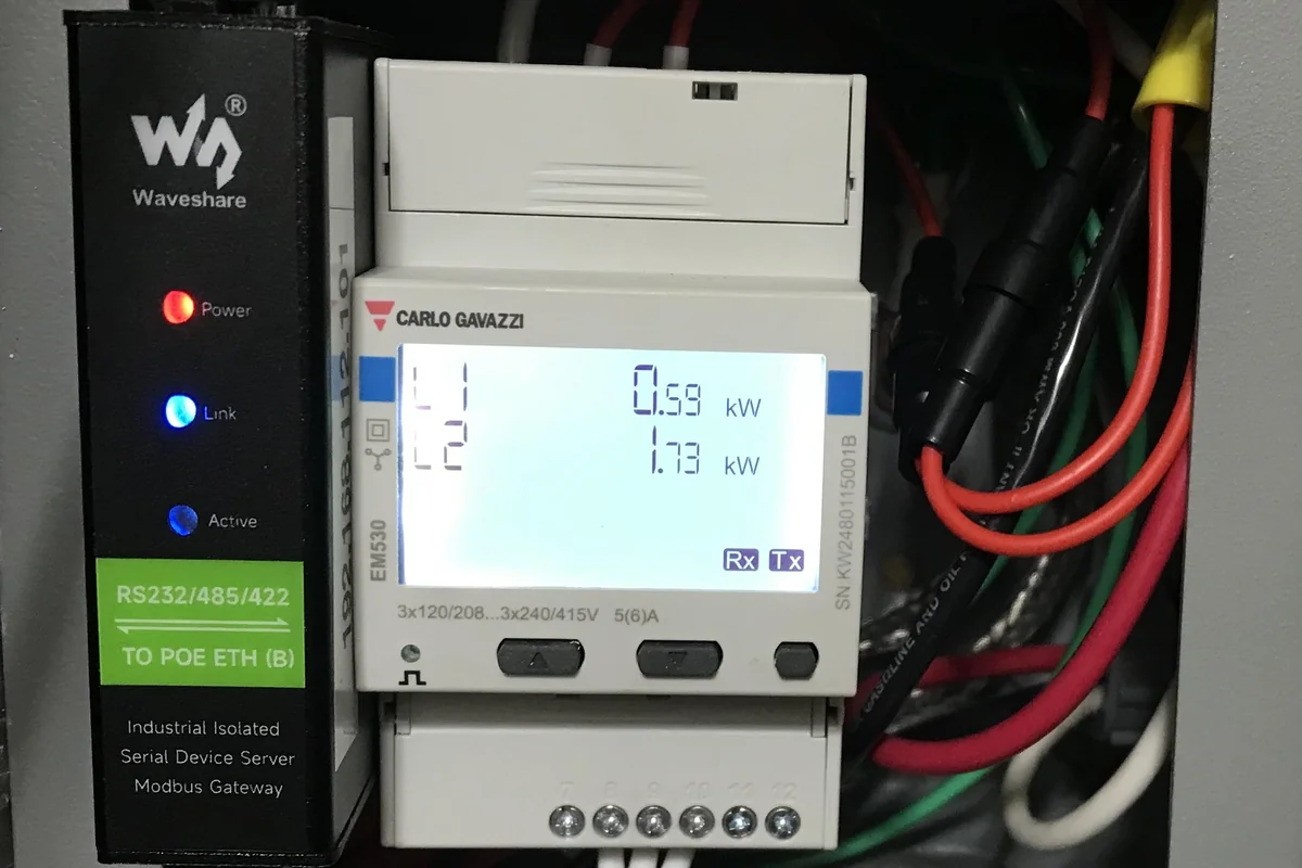 Electronic metering enclosure and PCB board optimized for minimal layer count and streamlined BOM